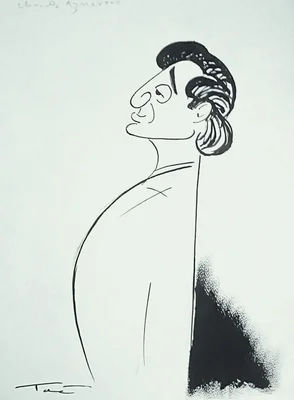 Portrait of French singer Charles Aznavour singing on stage