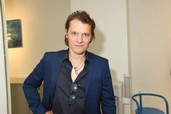 Benabar aka Bruno Nicolini poses during Agnes B. Menswear Spring/Summer 2018 show as part of Paris Fashion Week ton June 25, 2017 in Paris, France.