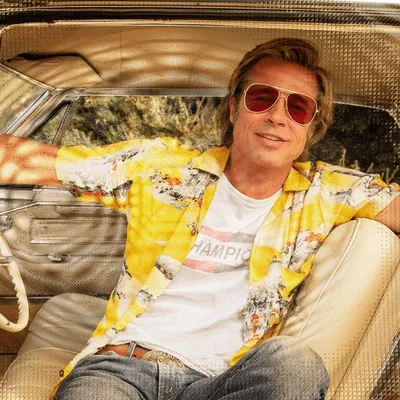 Comparing Tarantino's warm style with Fincher's cold realism.