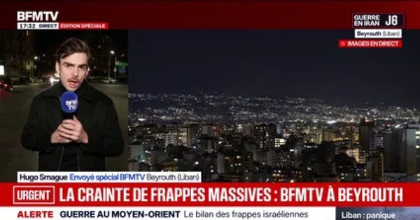 Un journaliste de BFMTV en direct face au paysage nocturne de Beyrouth.