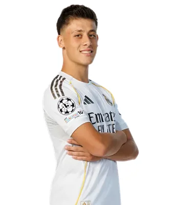 Arda Güler, milieu de terrain du Real Madrid, posant en maillot officiel.