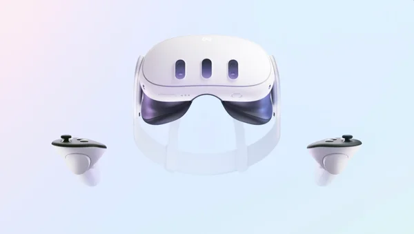 Le casque Meta Quest 3 et ses deux manettes présentés sur un fond coloré.