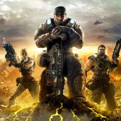 Soldats d'élite de Gears of War dans un environnement dévasté.