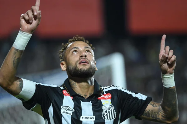 Neymar célébrant un but sous le maillot de Santos FC.