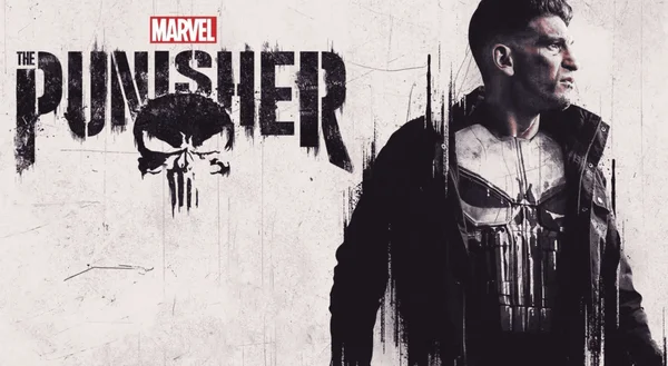 Affiche de 'The Punisher' avec Jon Bernthal arborant le célèbre crâne sur son gilet tactique.