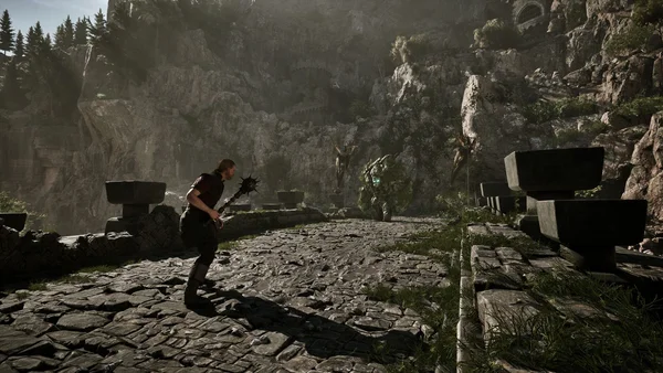 Combat rapproché dans le remake de Gothic : un héros à la masse contre un ennemi blindé.