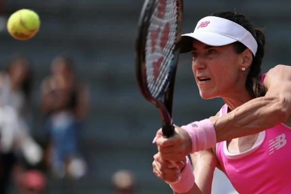Iga Swiatek en action lors d'un match à Roland-Garros.