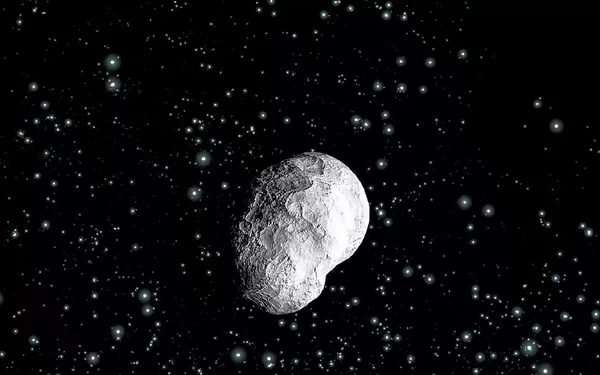 Astéroïde à la surface cratérisée photographié dans l'espace.